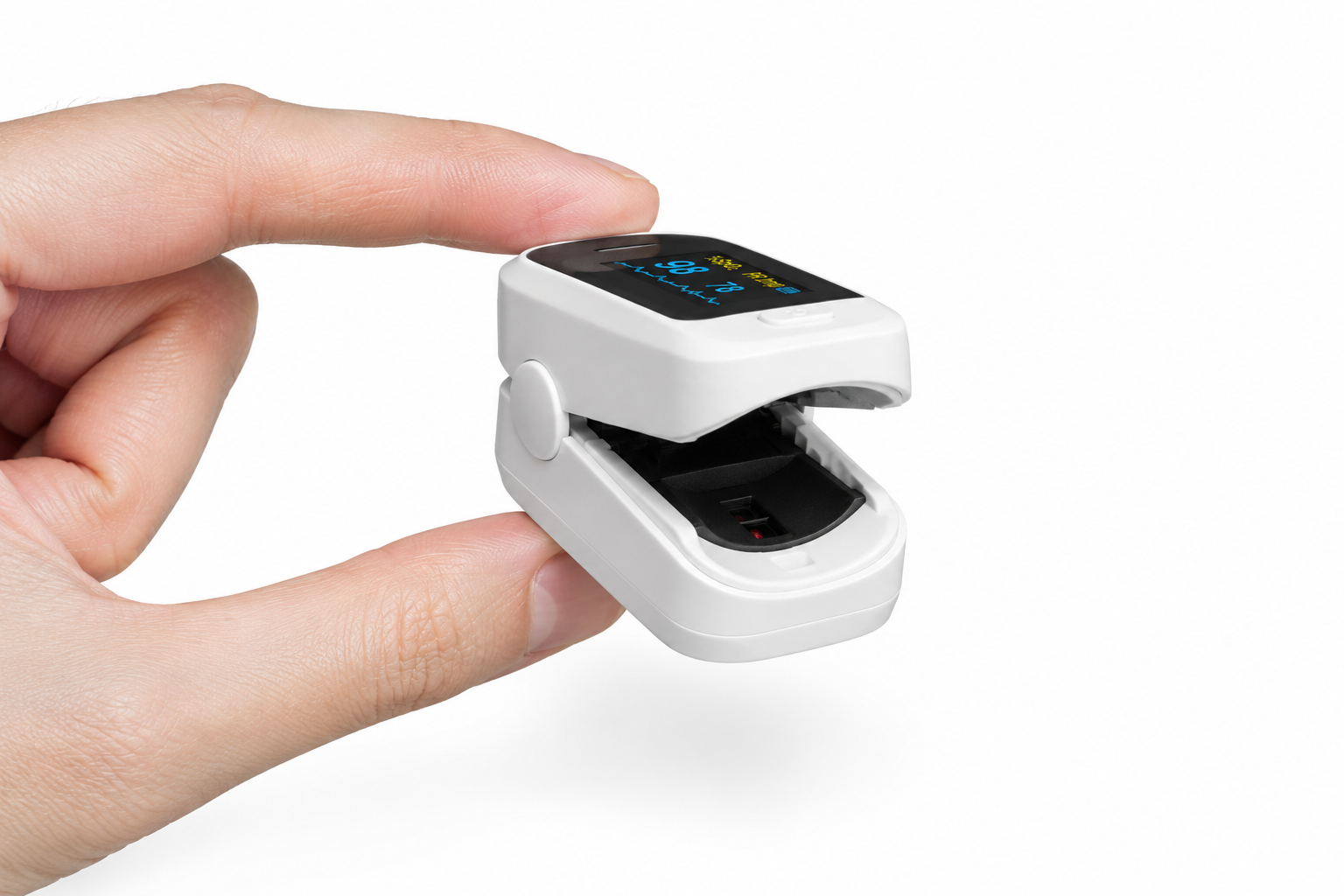 PulseGuard fingertip pulse oximeter held in hand against white background